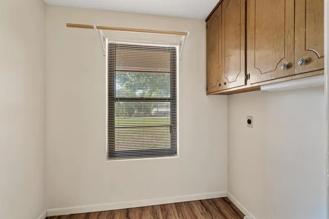 a view of a balcony with wooden floor