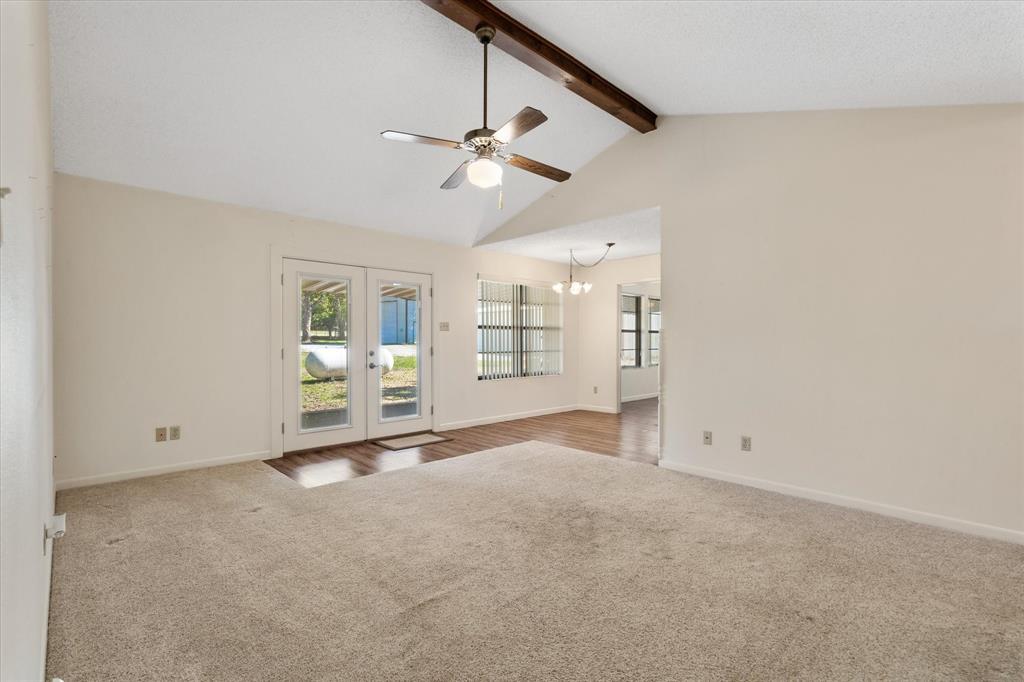 2711 Tin Top Road Weatherford, TX 76087 - Photo 8 of 22 a view of an empty room with a window