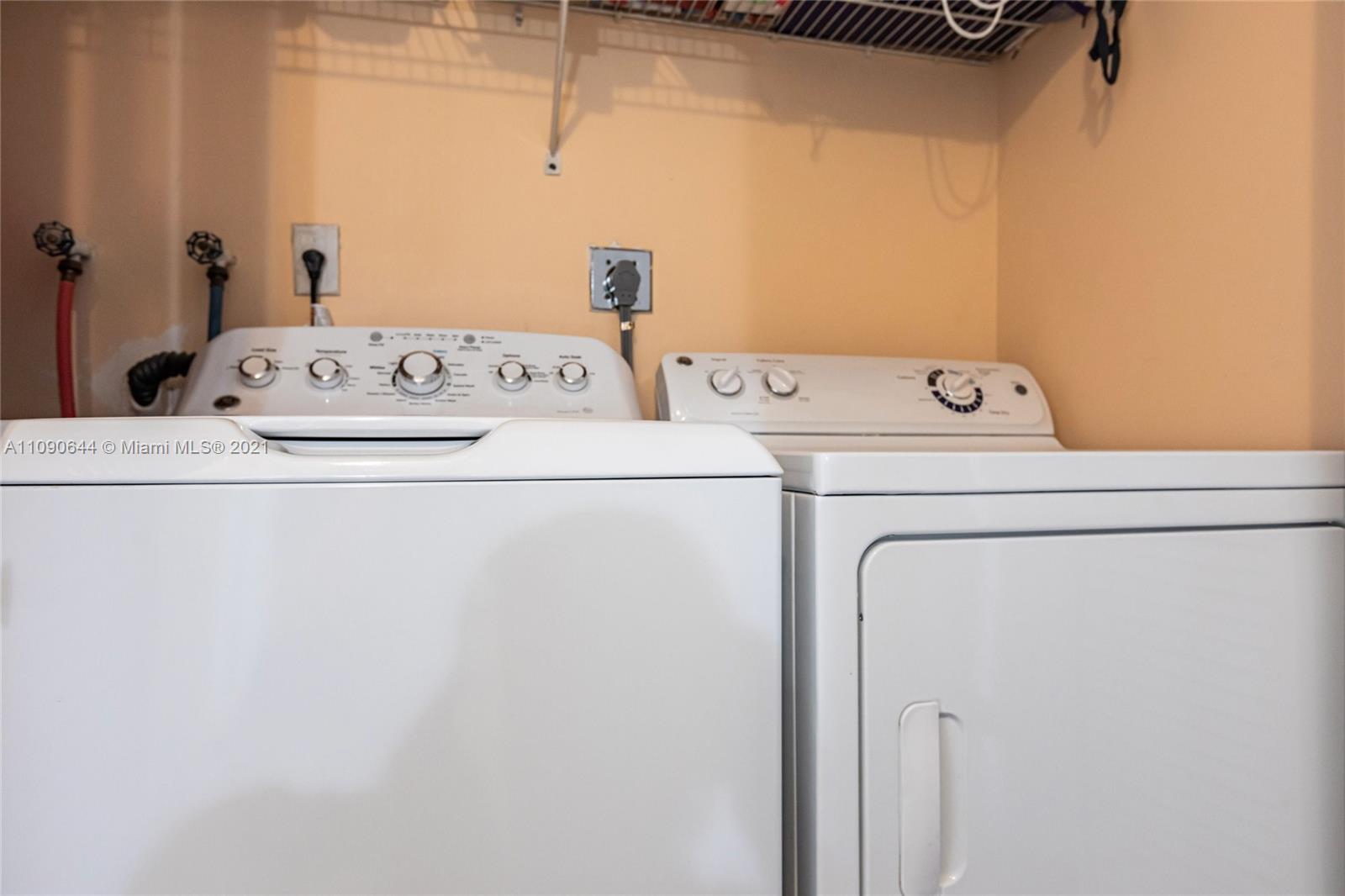 1925 Southwest 118th Court, Unit 138 Miami, FL 33175 - Photo 15 of 15 a utility room with dryer and washer