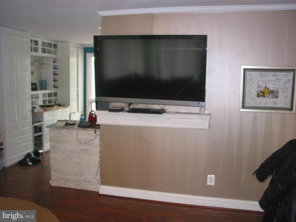 2416 Parallel Lane Silver Spring, MD 20904 - Photo 3 of 22 a living room with furniture and a flat screen tv
