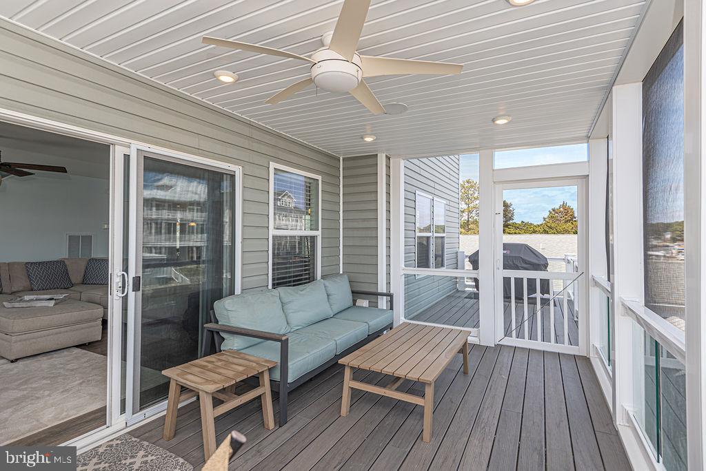 10404 New Quay Road Ocean City, MD 21842 - Photo 25 of 44 screen porch of living area