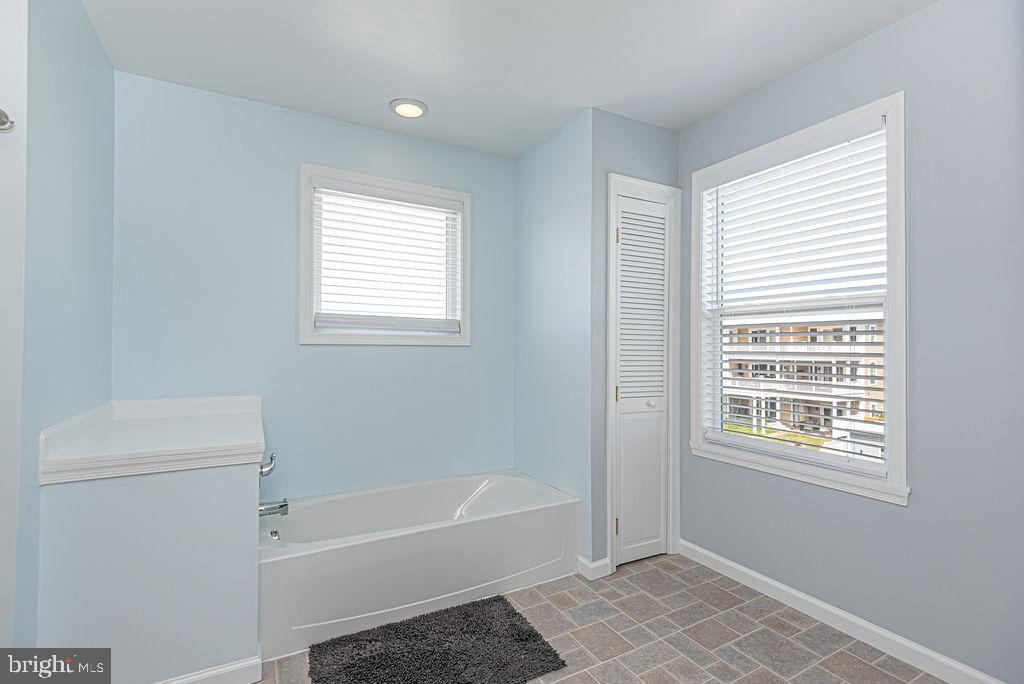 10404 New Quay Road Ocean City, MD 21842 - Photo 31 of 44 primary full bath with walkin shower and tub