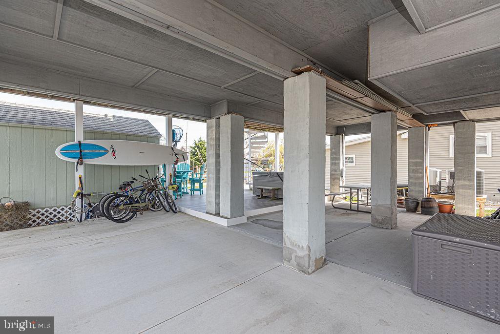 10404 New Quay Road Ocean City, MD 21842 - Photo 39 of 44 parking and covered storage and shed and shower