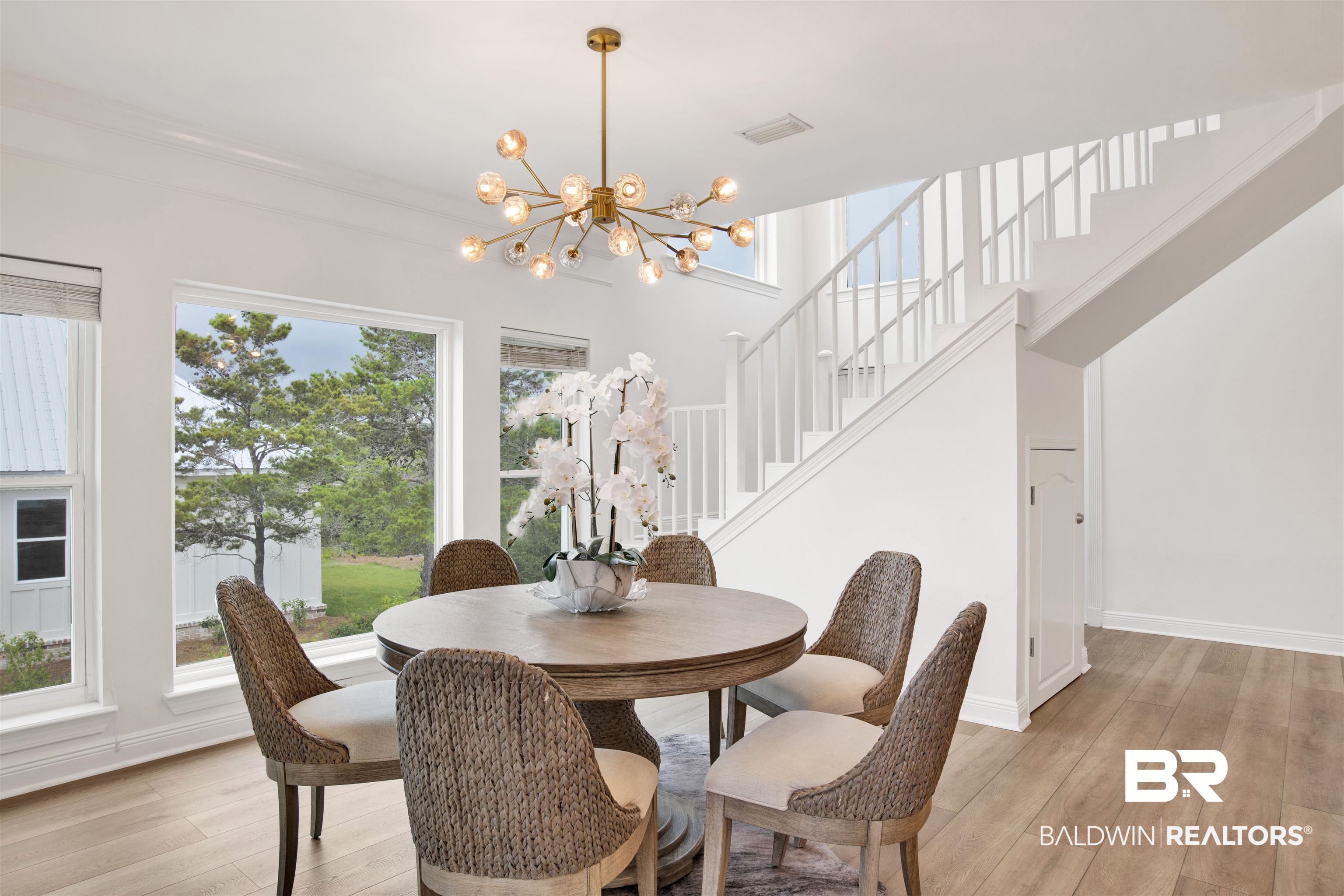 30351 River Road Orange Beach, AL 36561 - Photo 12 of 44 Open concept interior with light wood-finish flooring