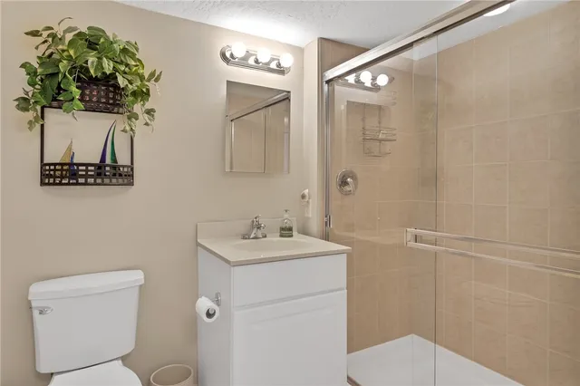 a view of a livingroom with furniture and windows