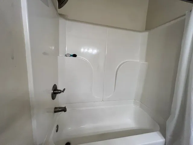 a close view of a bathtub in bathroom
