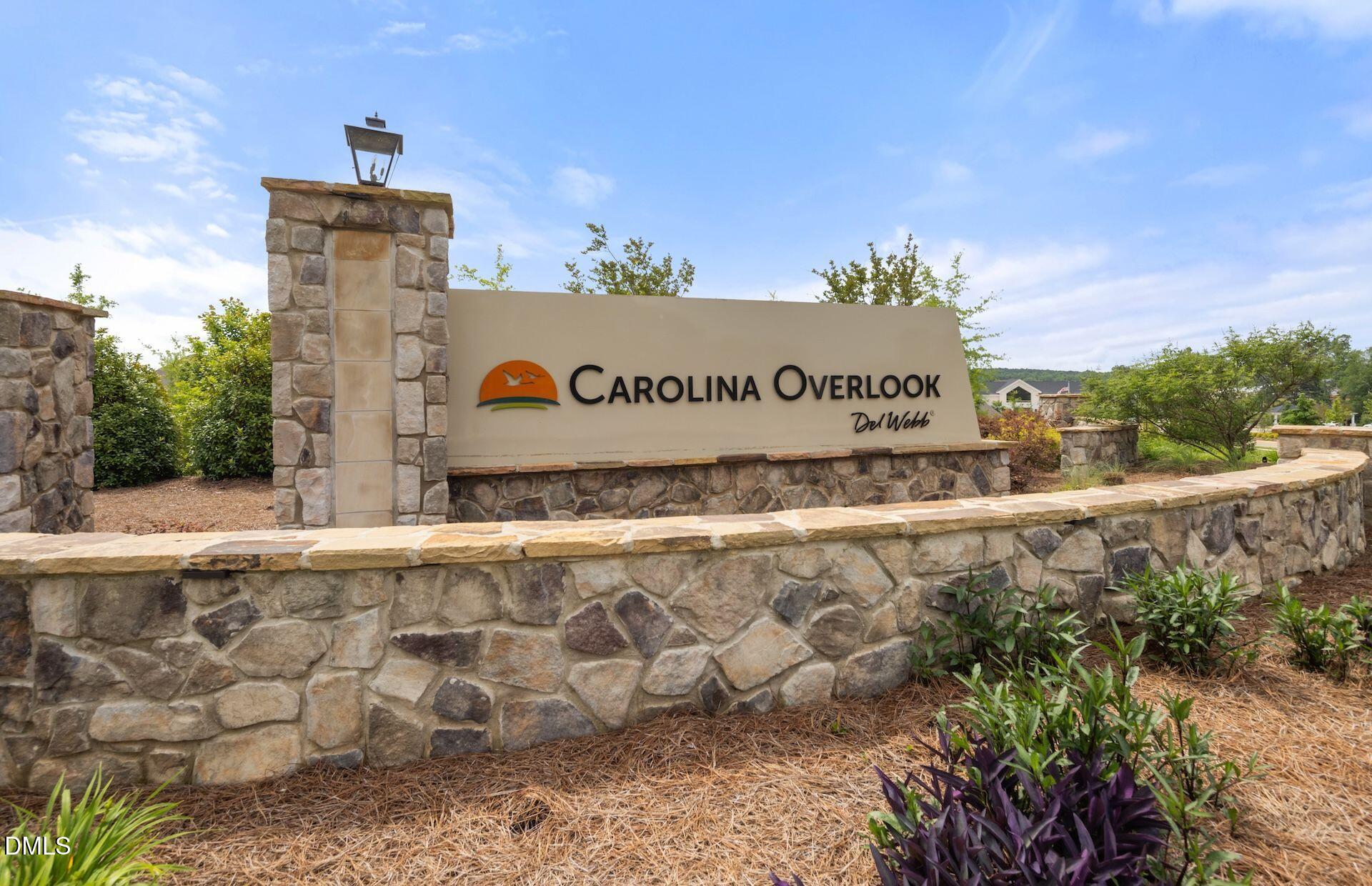 141 Omaha Way Clayton, NC 27520 - Photo 17 of 40 a sign on the side of a road