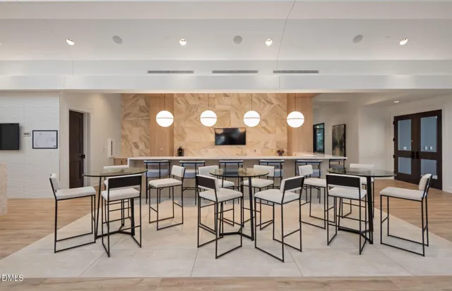 a view of a dining room and chairs