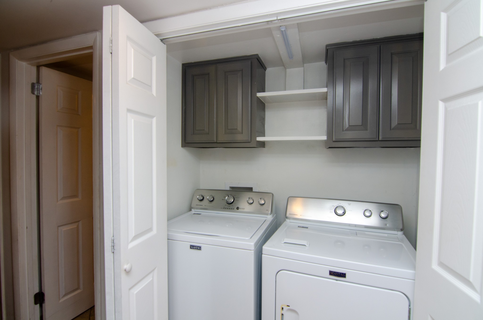 21 Vaughns Gap Road, Unit 110 Nashville, TN 37205 - Photo 16 of 19 a utility room with dryer and washer