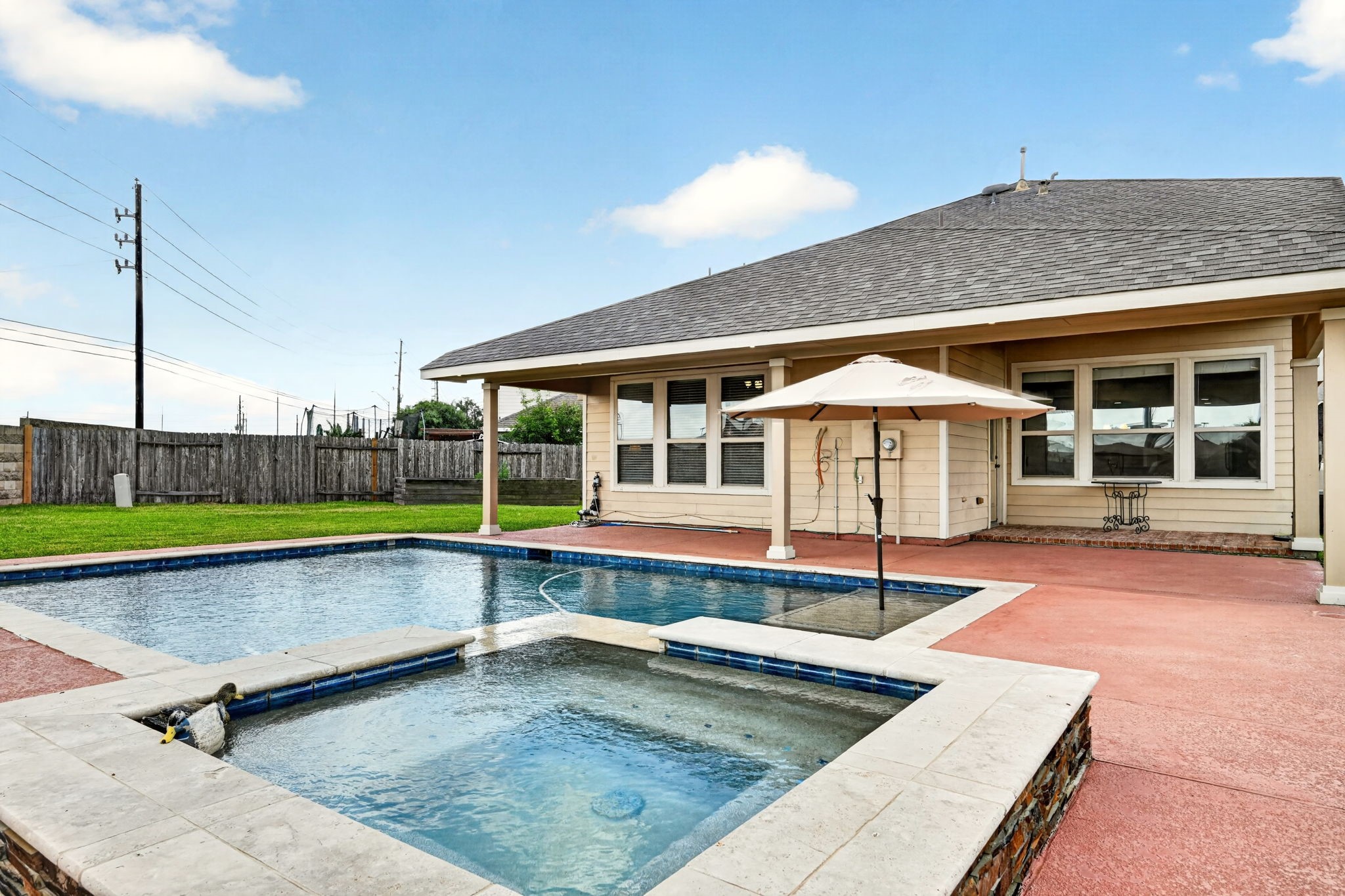 6446 Tea Tree Drive Katy, TX 77494 - Photo 3 of 39 The pool and covered patio will be a great place to enjoy a Texas summer.