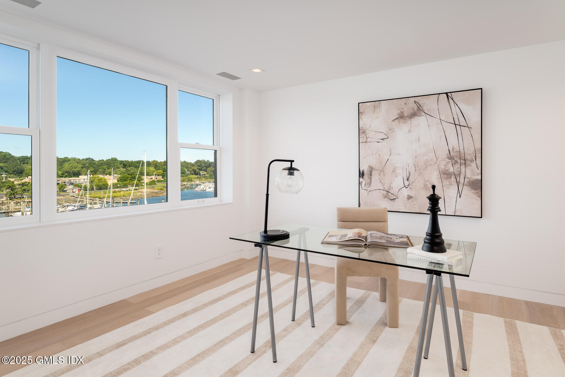 636 Steamboat Road, Unit 3A B & E Greenwich, CT 06830 - Photo 11 of 28 a view of workspace with wooden floor windows