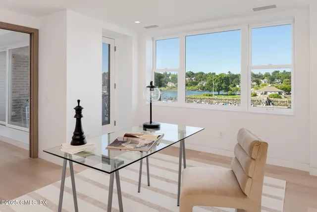 a bathroom with double vanity sinks and a large mirror