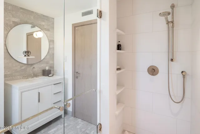 an aerial view of a house with a lake view