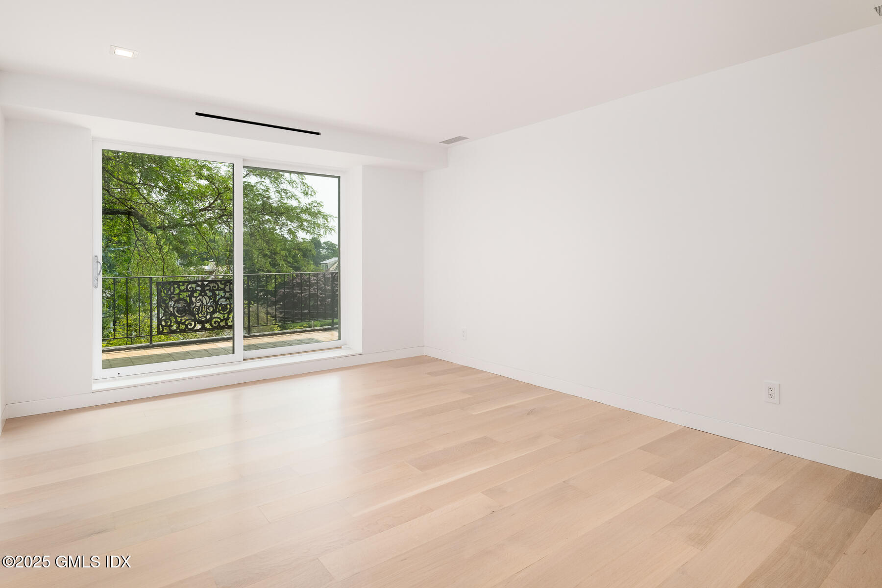 636 Steamboat Road, Unit 3A B & E Greenwich, CT 06830 - Photo 21 of 28 a view of an empty room with a window