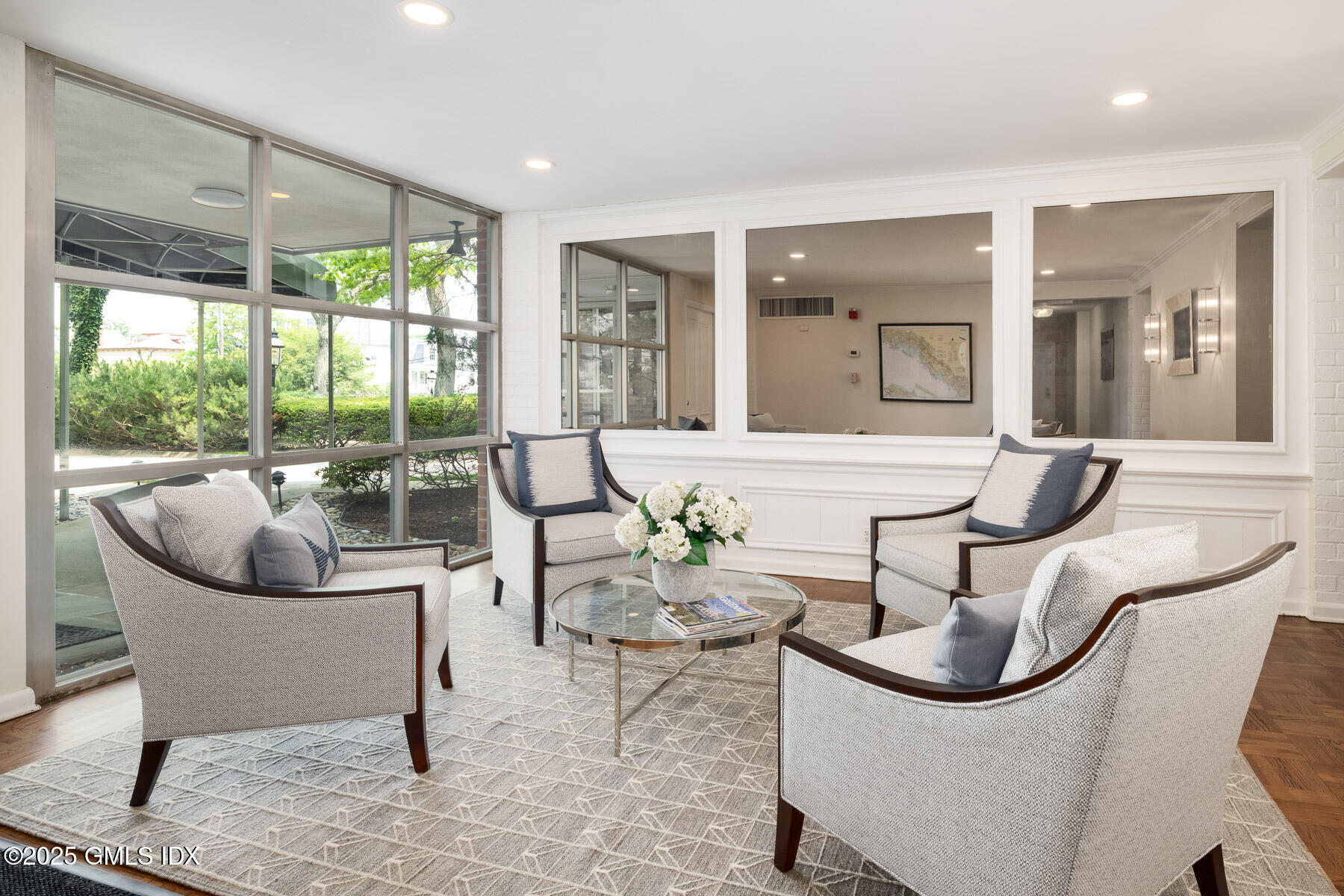 636 Steamboat Road, Unit 3A B & E Greenwich, CT 06830 - Photo 27 of 28 a living room with furniture and a large window