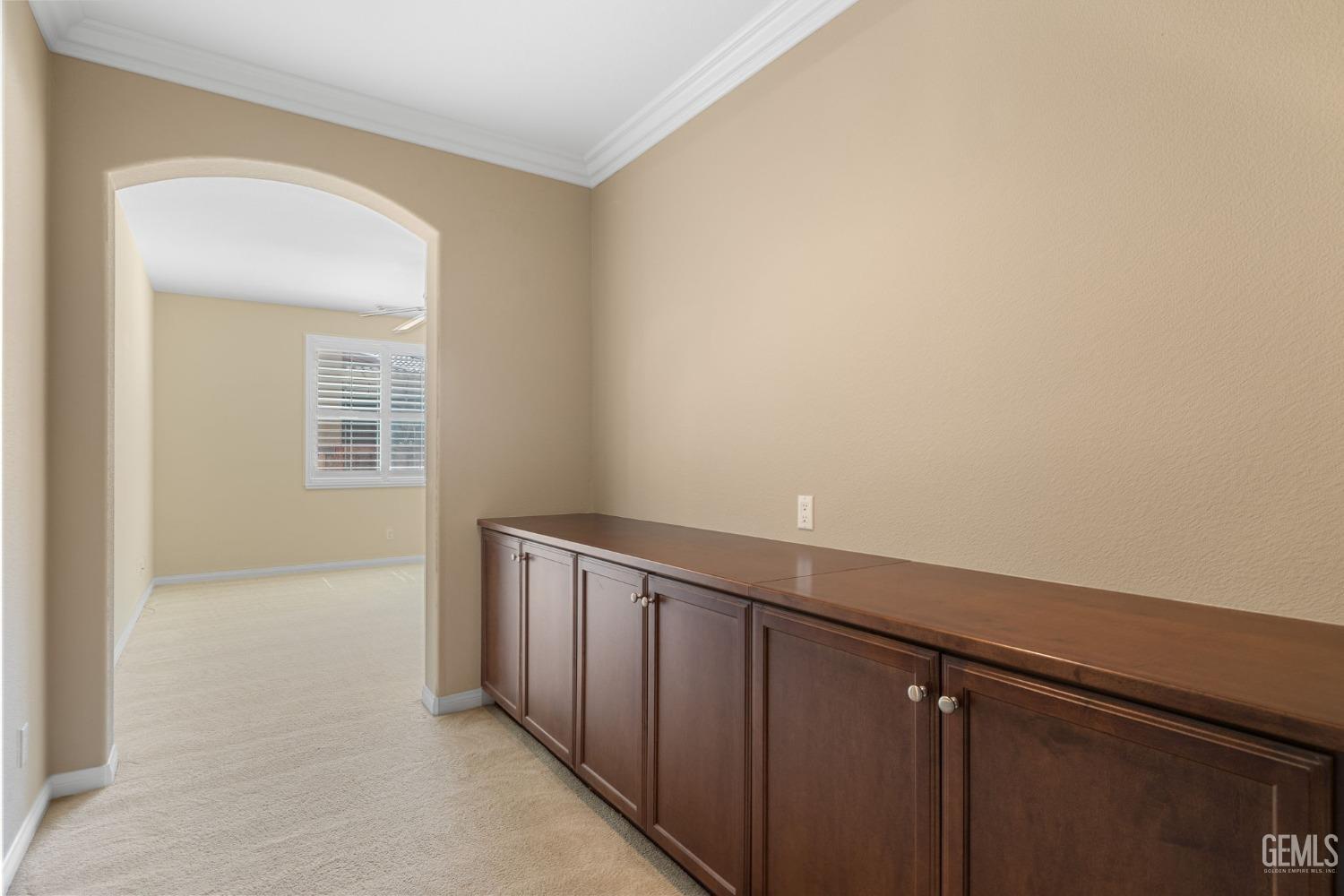 Undisclosed Address Bakersfield, CA 93306 - Photo 13 of 36 a view of a hallway with wooden floor
