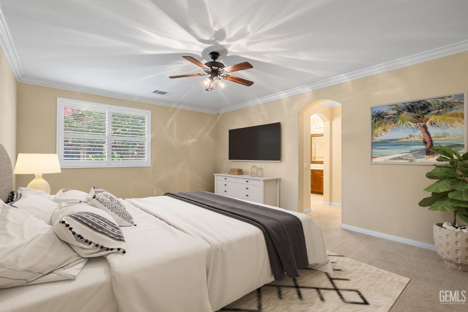 Undisclosed Address Bakersfield, CA 93306 - Photo 15 of 36 a bedroom with a bed and a flat screen tv