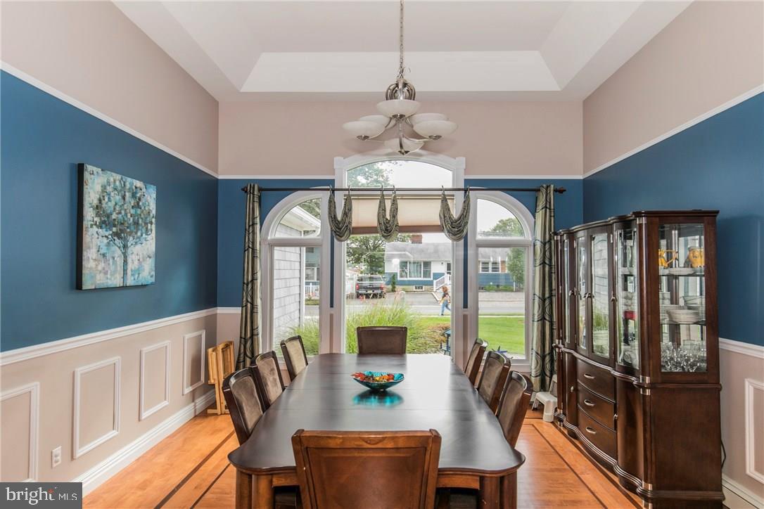 39 Harbor Inn Road Bayville, NJ 08721 - Photo 17 of 27 a view of a dining room with furniture window and outside view