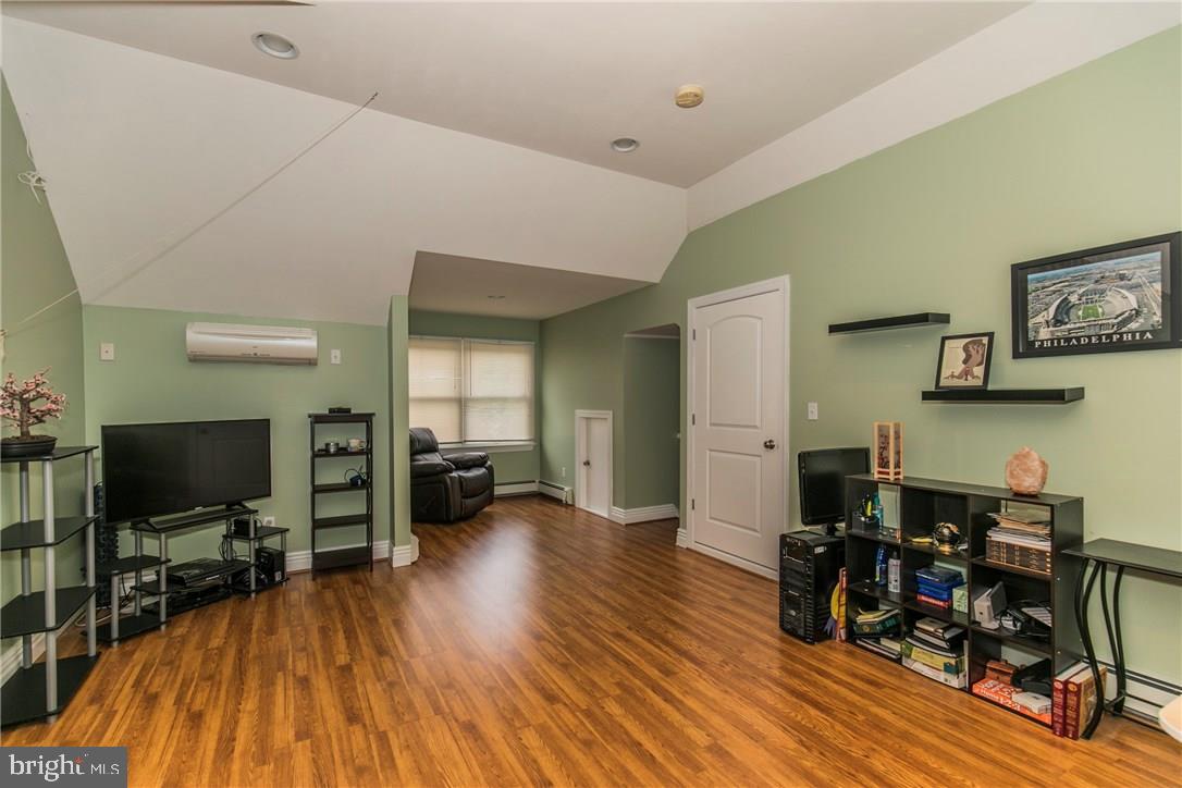 39 Harbor Inn Road Bayville, NJ 08721 - Photo 22 of 27 a view of a dining room with furniture and wooden floor