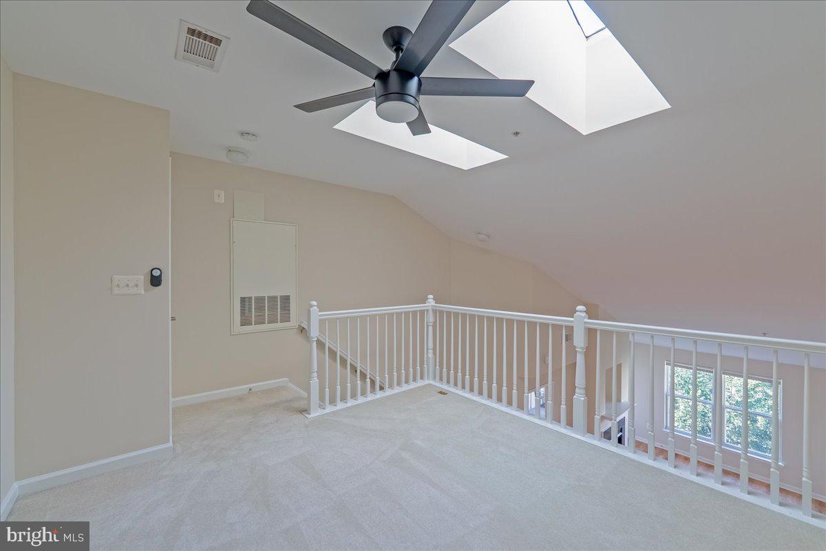 12000 Market Street, Unit 469 Reston, VA 20190 - Photo 17 of 41 a view of a balcony with a ceiling fan
