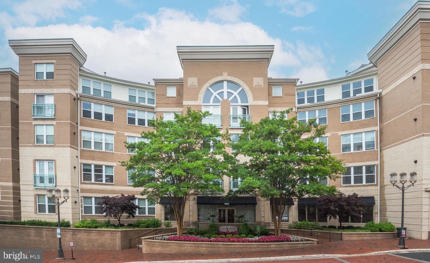 12000 Market Street, Unit 469 Reston, VA 20190 - Photo 3 of 41 a front view of a building with street view
