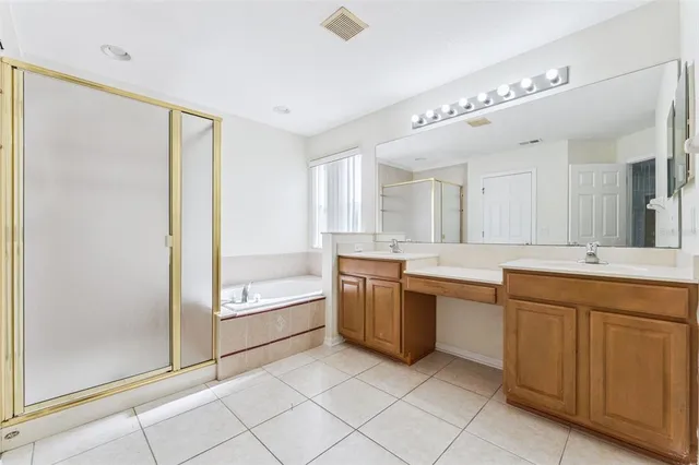 a bathroom with a sink toilet and bathtub