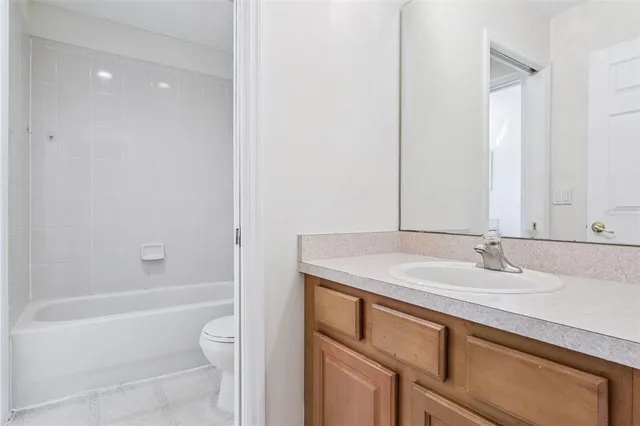 a view of backyard with green space