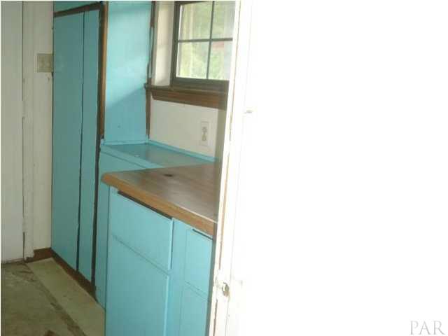 6496 Bellview Pines Road Pensacola, FL 32526 - Photo 14 of 18 Storage in Laundry Room