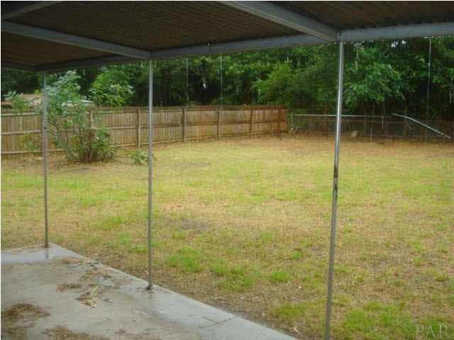 6496 Bellview Pines Road Pensacola, FL 32526 - Photo 6 of 18 Back Patio and yard