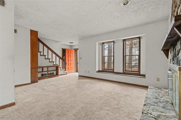 an empty room with windows