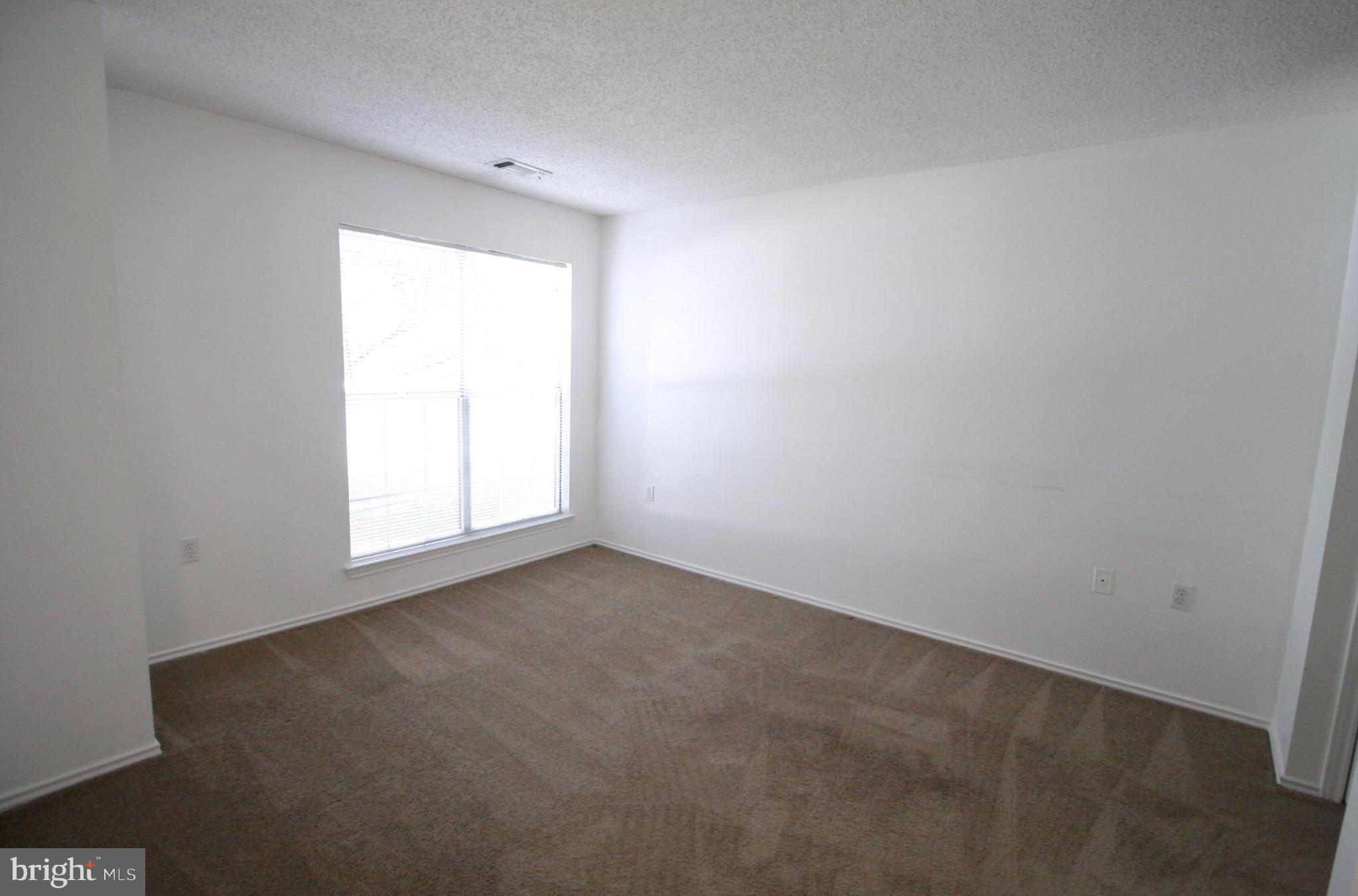 21009 Timber Ridge Terrace, Unit 101 Ashburn, VA 20147 - Photo 12 of 27 Bedroom #1