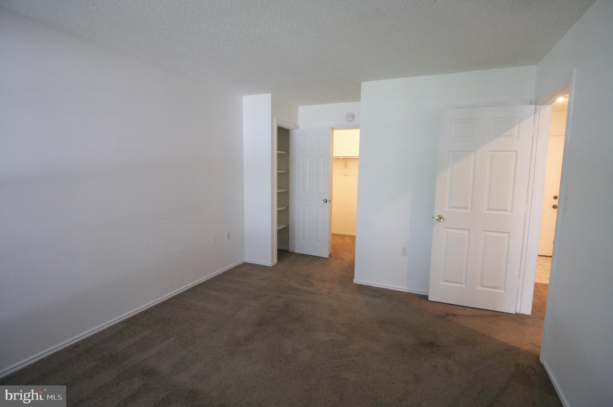 21009 Timber Ridge Terrace, Unit 101 Ashburn, VA 20147 - Photo 15 of 27 Bedroom #1, connects to bathroom