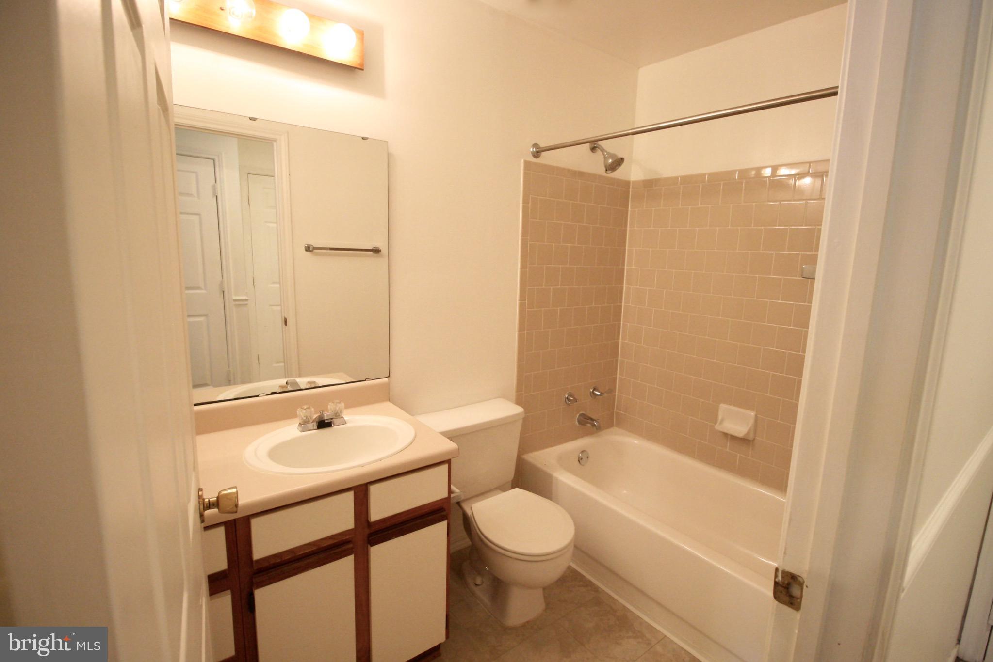 21009 Timber Ridge Terrace, Unit 101 Ashburn, VA 20147 - Photo 16 of 27 Bathroom #1