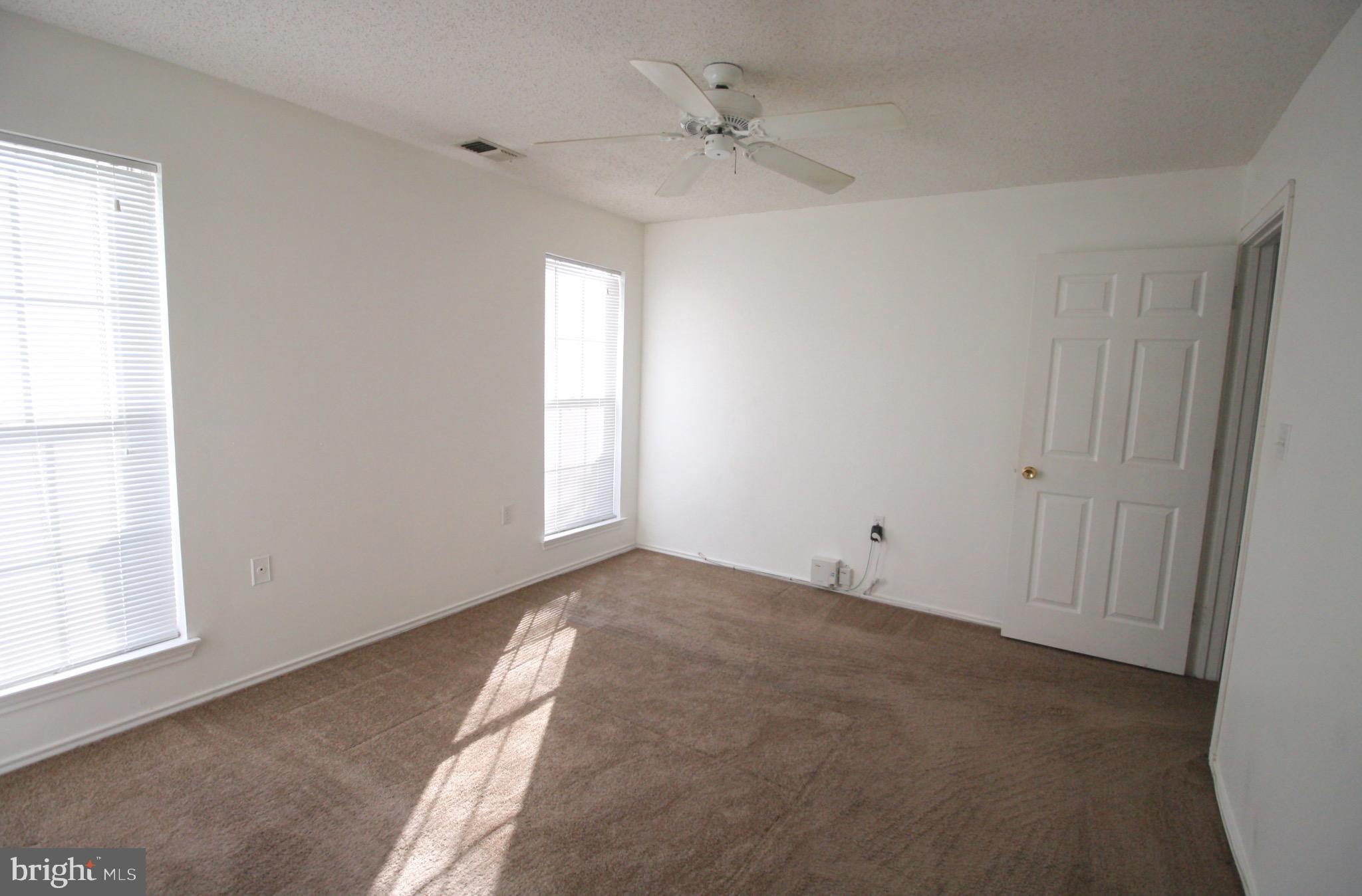 21009 Timber Ridge Terrace, Unit 101 Ashburn, VA 20147 - Photo 19 of 27 Bedroom #2, with 2 windows