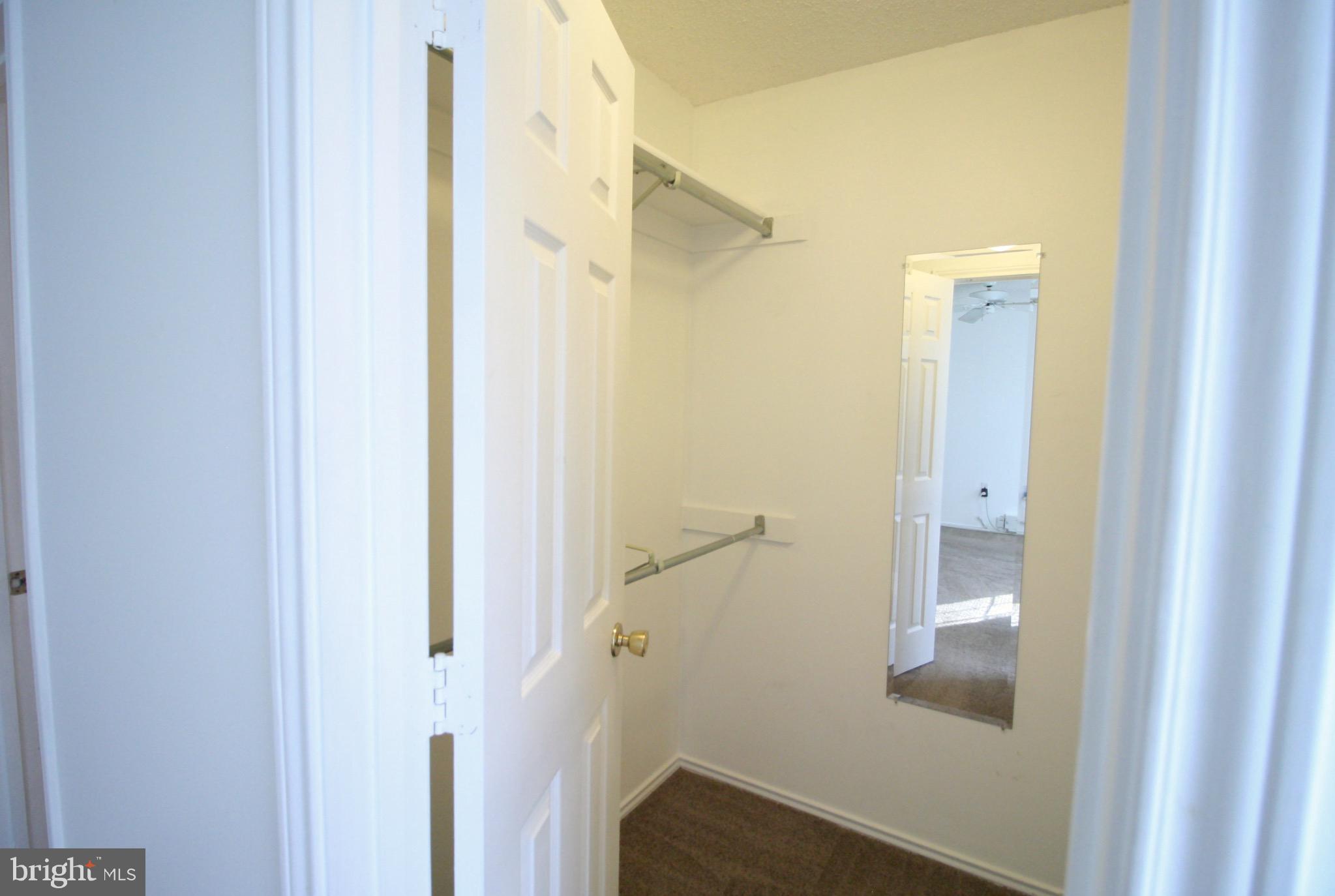 21009 Timber Ridge Terrace, Unit 101 Ashburn, VA 20147 - Photo 20 of 27 Walk in closet #2