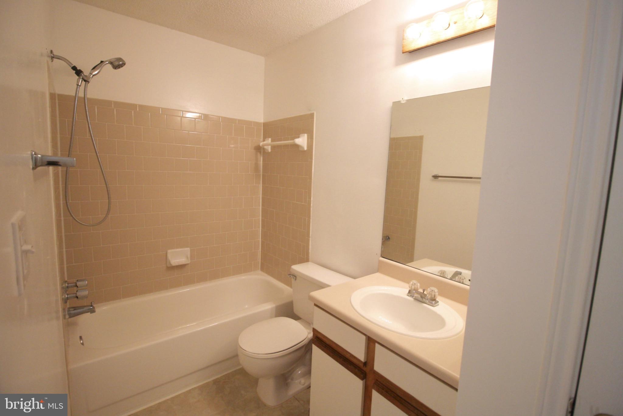 21009 Timber Ridge Terrace, Unit 101 Ashburn, VA 20147 - Photo 22 of 27 Bathroom #2