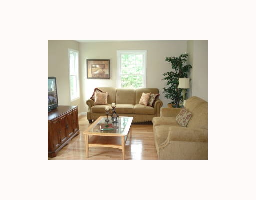 39 Mill Pond Road, Unit 22 Burrillville, RI 02830 - Photo 4 of 8 Living Room.