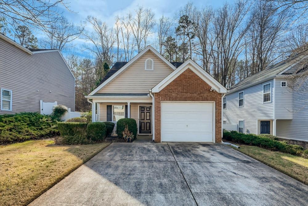 263 Silver Ridge Drive Dallas, GA 30157 - Photo 1 of 1 a front view of a house with garden
