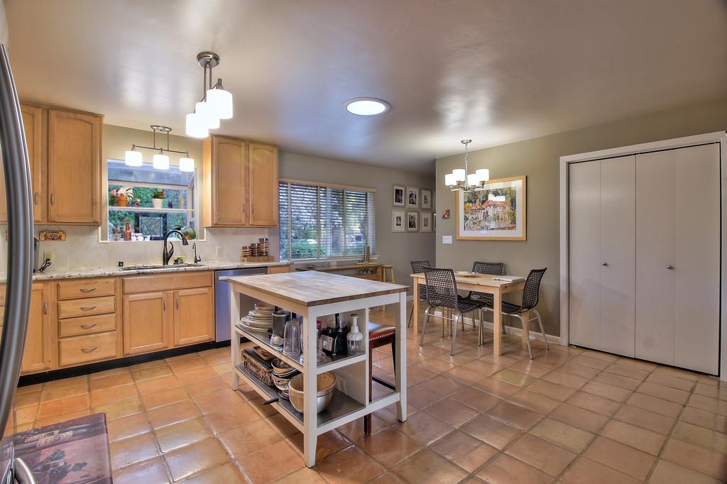 180 Locust Lane Ben Lomond, CA 95005 - Photo 11 of 33 a kitchen with a sink counter top space and stainless steel appliances
