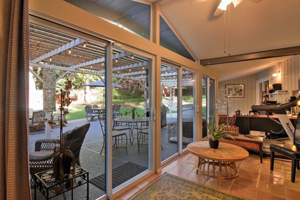 180 Locust Lane Ben Lomond, CA 95005 - Photo 6 of 33 a dining room with furniture and large windows