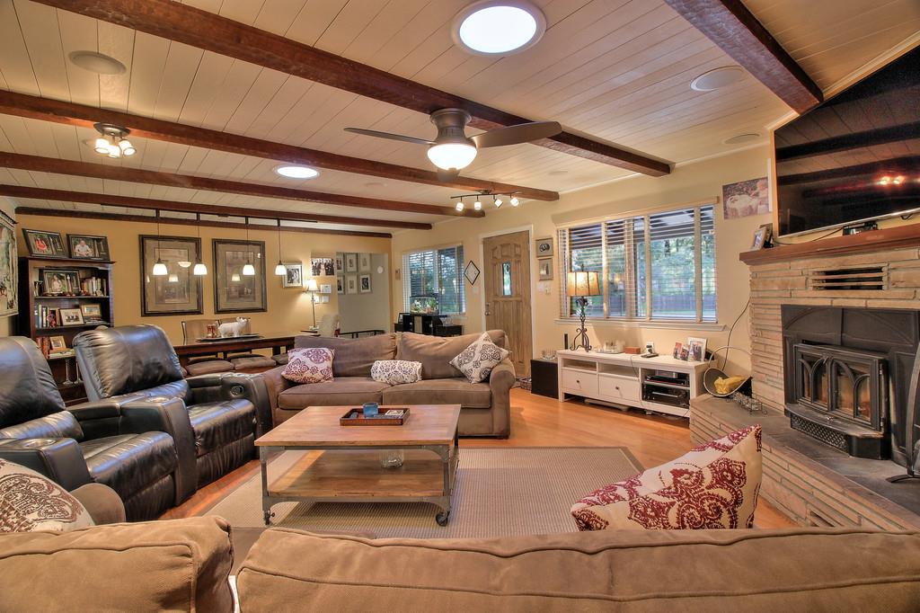 180 Locust Lane Ben Lomond, CA 95005 - Photo 7 of 33 a living room with furniture fireplace and a flat screen tv