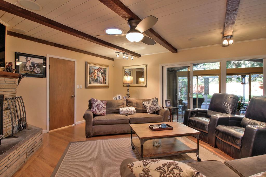 180 Locust Lane Ben Lomond, CA 95005 - Photo 10 of 33 a living room with furniture ceiling fan and a rug