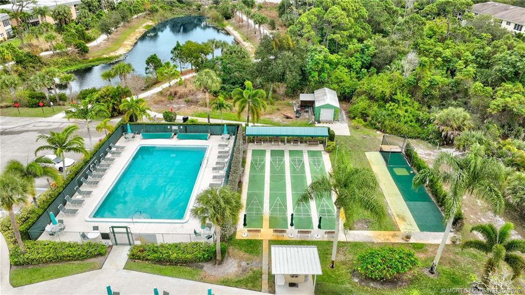 2950 Southeast Ocean Boulevard, Unit 1357 Stuart, FL 34996 - Photo 19 of 25 front view of house with a yard