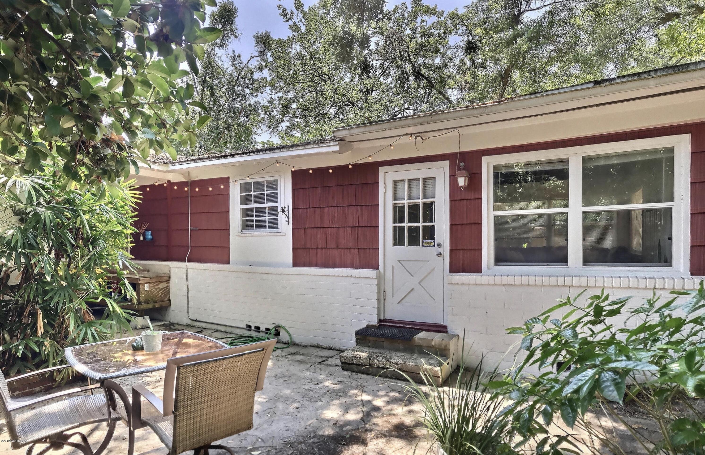 4631 Martingale Road Jacksonville, FL 32210 - Photo 8 of 27 front view of a house with a potted plant