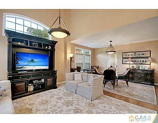 191 Smoke Rise Road Bernards, NJ 07920 - Photo 13 of 25 a living room with furniture and a flat screen tv