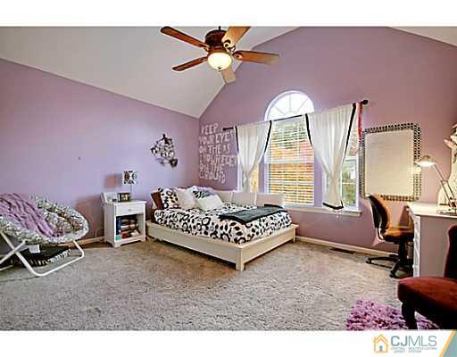 191 Smoke Rise Road Bernards, NJ 07920 - Photo 17 of 25 a bedroom with furniture and a window