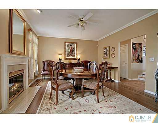 191 Smoke Rise Road Bernards, NJ 07920 - Photo 5 of 25 a view of a livingroom with furniture and a fireplace