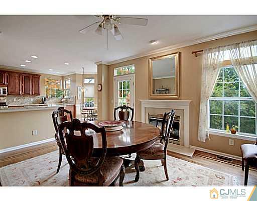 191 Smoke Rise Road Bernards, NJ 07920 - Photo 6 of 25 a dining room with furniture window and wooden floor