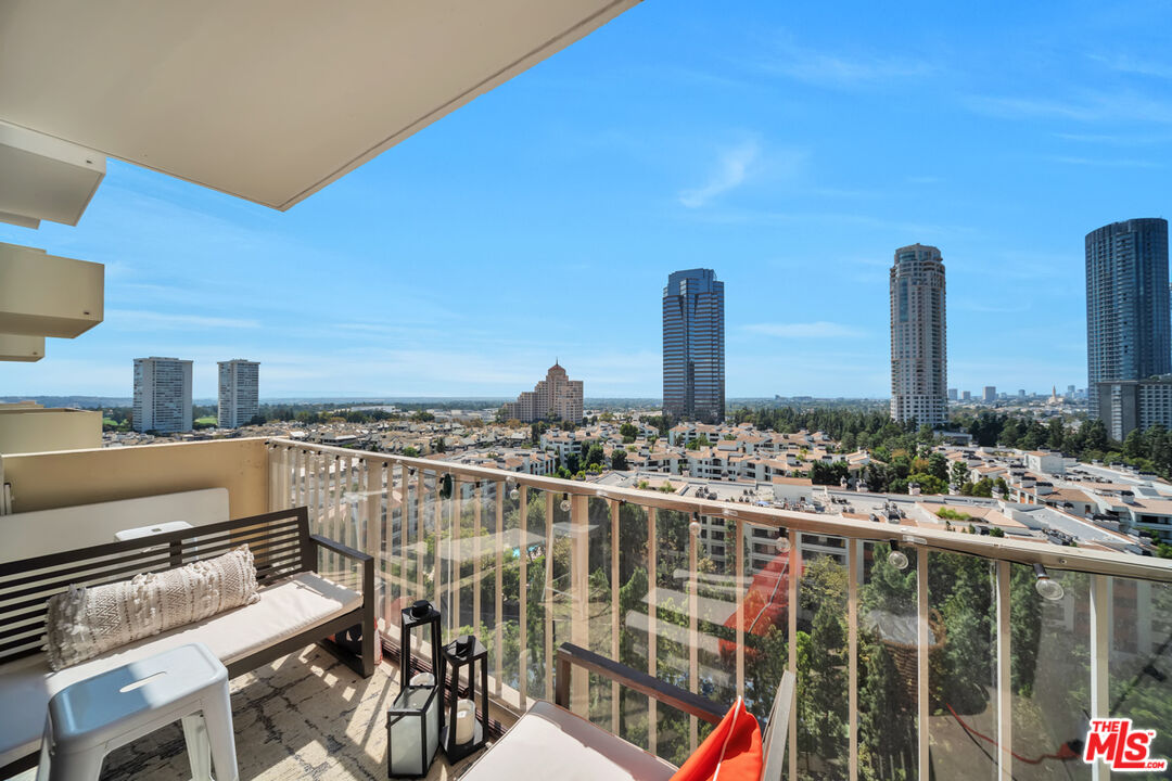2170 Century Park East, Unit 1807 Los Angeles, CA 90067 - Photo 14 of 30 a view of a balcony with chairs