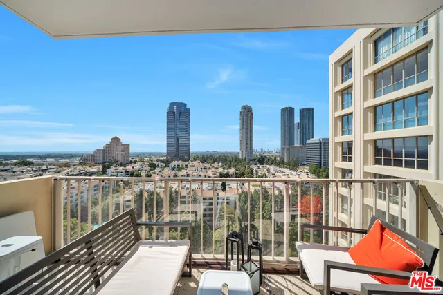 a view of a balcony with city view